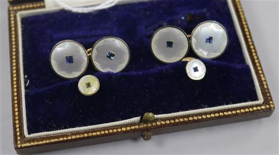 A early 20th century cased 18ct & 9ct gold, mother of pearl and gem set four piece dress stud set.